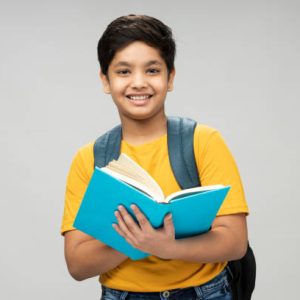 Photo of school boy wear yellow t-shirt backpack in background